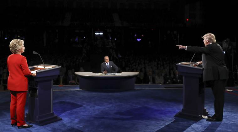 Republican presidential nominee Donald Trump points toward Democratic presidential nominee Hillary Clinton during the presidential debate at Hofstra University in Hempstead, N.Y., Monday, Sept. 26, 2016. (Joe Raedle/Pool via AP)